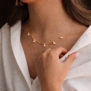 delicate-gold-floral-link-necklace-with-butterfly-accents