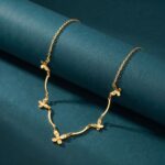 delicate-gold-floral-link-necklace-with-butterfly-accents