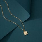minimal-gold-butterfly-pendant-necklace-with-beaded-chain
